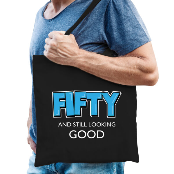 Fifty and still looking good verjaardag cadeau tas zwart voor heren - Verjaardag / Abraham